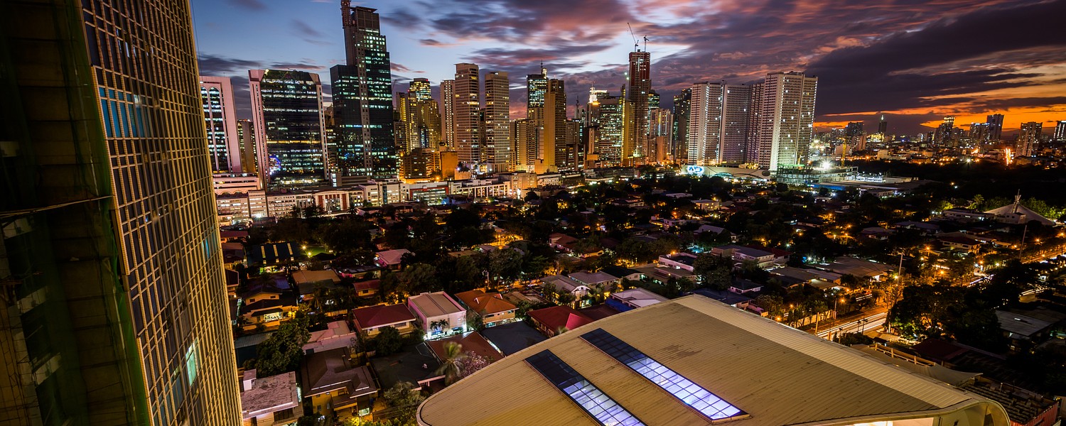 View of the skyline of Makati at sunset, in Metro Manila, The Philippines.